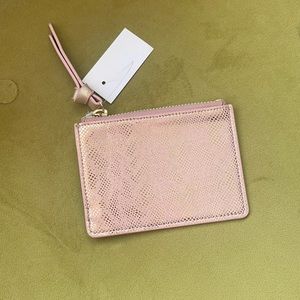 Brand new Loft card holder. Never been used, tags attached!